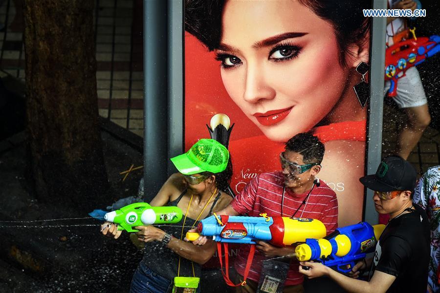 People participate in a water fight during the Songkran Festival celebration in Bangkok, Thailand, April 13, 2017. Songkran Festival, also known as water festival, is celebrated in Thailand as the traditional New Year\'s Day, which normally falls on April 13 to 15. (Xinhua/Rachen Sageamsak)