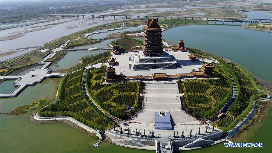 Photo taken on April 27, 2017 shows Huanghe Cultural Park in Qingtongxia City, northwest China\'s Ningxia Hui Autonomous Region. Located on the west bank of the Yellow River, the main building of the park is 108 meters high and is used as an exhibition hall to display Yellow River cultures. (Xinhua/Wang Peng)