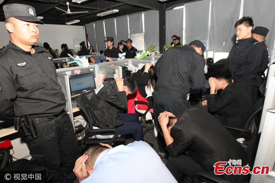 153 suspects caught in $11.7 million telecom fraud(1/3)