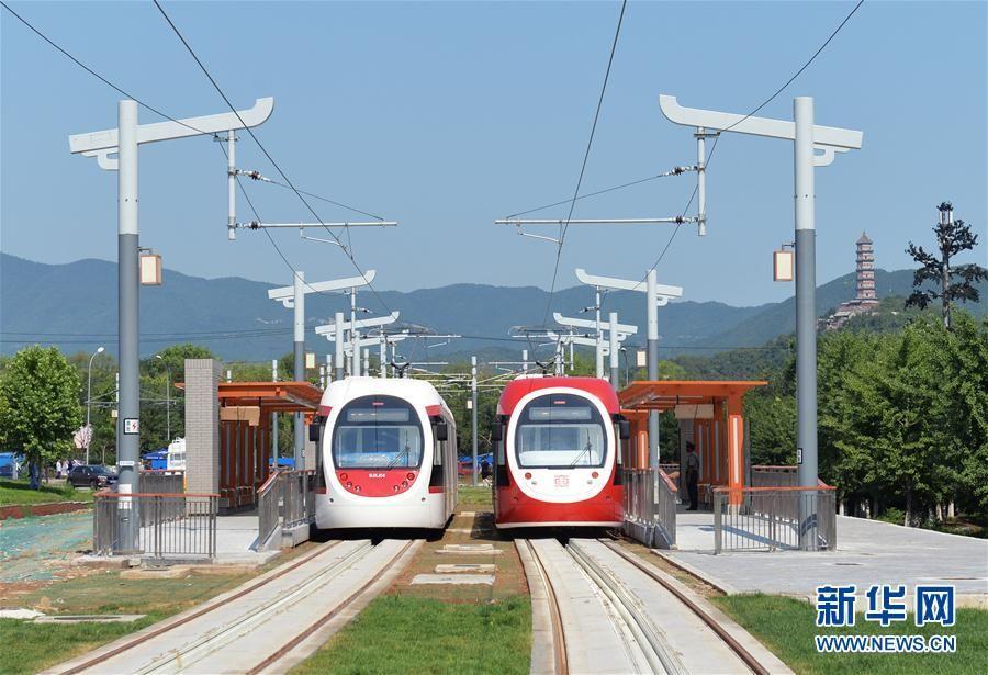 A new model of tram, applauded as the most beautiful tram, is being tested on the western suburbs line in Beijing, June 26, 2017. (Photo/Xinhua)