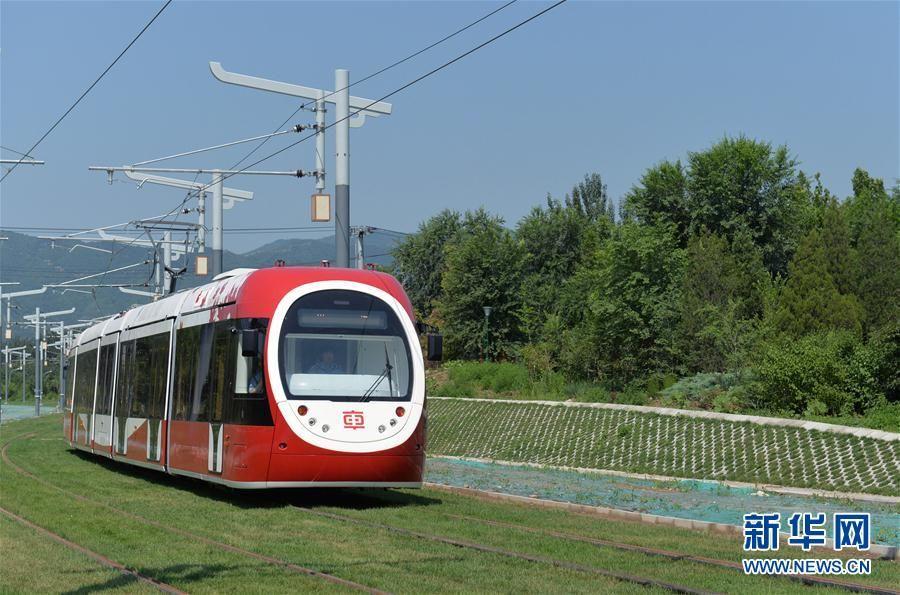 A new model of tram, applauded as the most beautiful tram, is being tested on the western suburbs line in Beijing, June 26, 2017. A modern tramcar network in Beijing will be established by the end of the year in an effort to provide visitors with a unique traveling experience. The network will cover major tourist sites in the city including the Summer Palace, and will have a top speed of 70 kilometers per hour. (Photo/Xinhua)