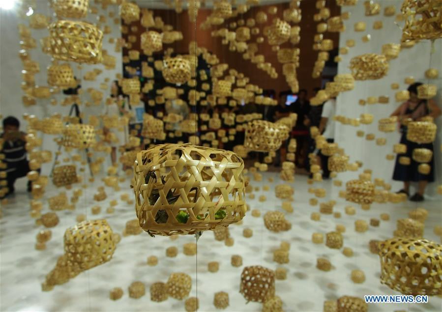 Grasshopper cages set as decorations designed for music festival in Shanghai(1/4)