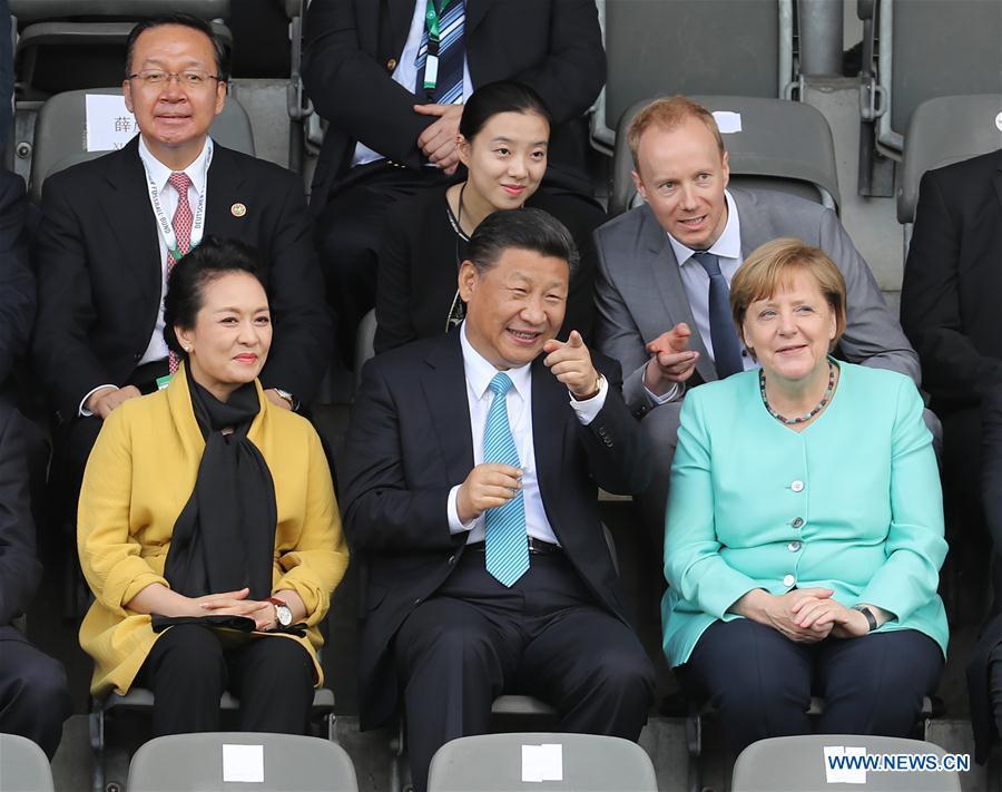 Xi, Merkel watch friendly football match between Chinese, German youth teams(1/3)