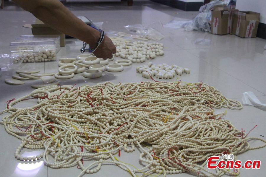 Ivory products seized by police are on display in Fangchenggang City, South China’s Guangxi Zhuang Autonomous Region, July 17, 2017. Local police detained two suspects and seized 11.671 kilograms of ivory products. China announced a phased schedule in an attempt to curb ivory processing and sales by March 31, 2017, and to eventually stop all ivory processing and sales by the end of 2017. (Photo: China News Service/Zhang Zhenguo)