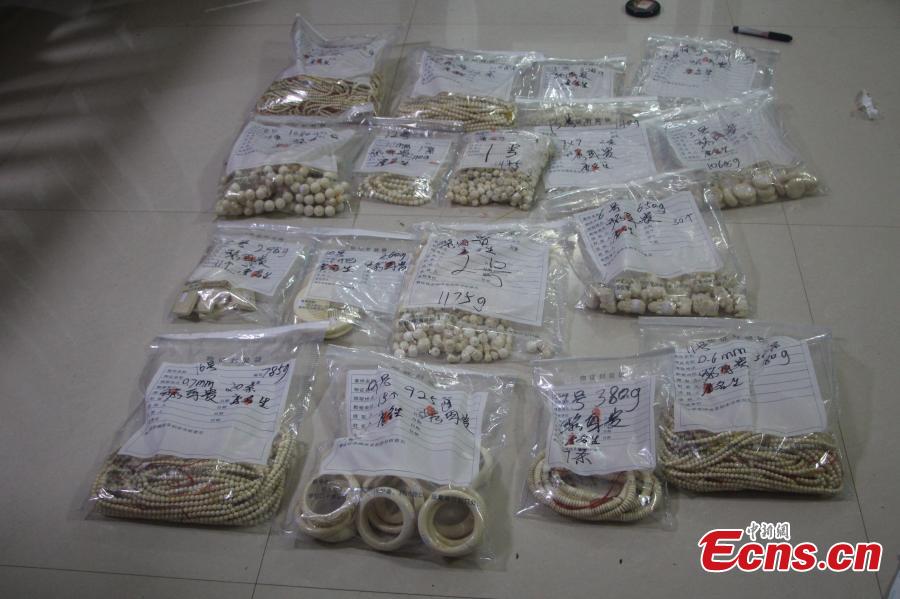Ivory products seized by police are on display in Fangchenggang City, South China’s Guangxi Zhuang Autonomous Region, July 17, 2017. Local police detained two suspects and seized 11.671 kilograms of ivory products. China announced a phased schedule in an attempt to curb ivory processing and sales by March 31, 2017, and to eventually stop all ivory processing and sales by the end of 2017. (Photo: China News Service/Zhang Zhenguo)