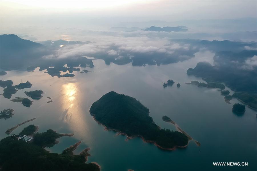 Aerial photo taken on Aug. 8, 2017 shows the scenery of Qiandao Lake, or Thousand-Island Lake, in Chun\'an County, east China\'s Zhejiang Province. The lake covers 573 square kilometers, and is home to 114 known fish species, with an economic value of over 4 billion yuan (600 million U.S. dollars). (Xinhua/Zhang Cheng)