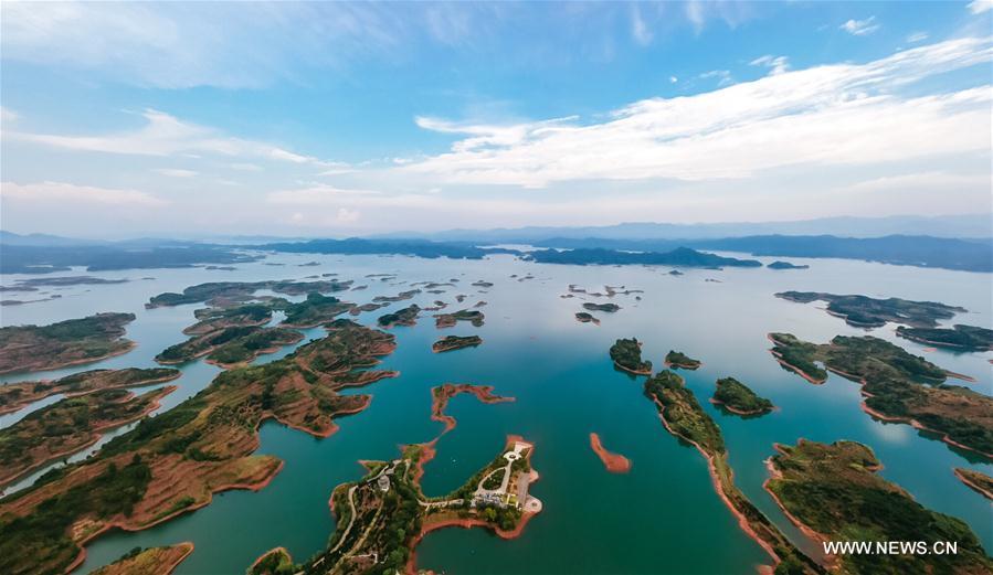 Aerial photo taken on Aug. 7, 2017 shows the scenery of Qiandao Lake, or Thousand-Island Lake, in Chun\'an County, east China\'s Zhejiang Province. The lake covers 573 square kilometers, and is home to 114 known fish species, with an economic value of over 4 billion yuan (600 million U.S. dollars). (Xinhua/Zhang Cheng)