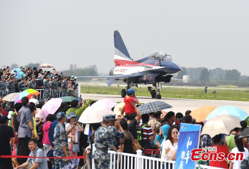 A plane of the Bayi (August 1) Aerobatics Team lands after finishing a performance at an air show in Changchun City, the capital of Northeast China’s Jilin Province, Aug. 10, 2017. The show is also part of the International Army Games, which run from July 29 to Aug. 12 and consist of 28 competitions to be held in Russia, China, Azerbaijan, Belarus and Kazakhstan. (Photo: China News Service/Zhang Yao)