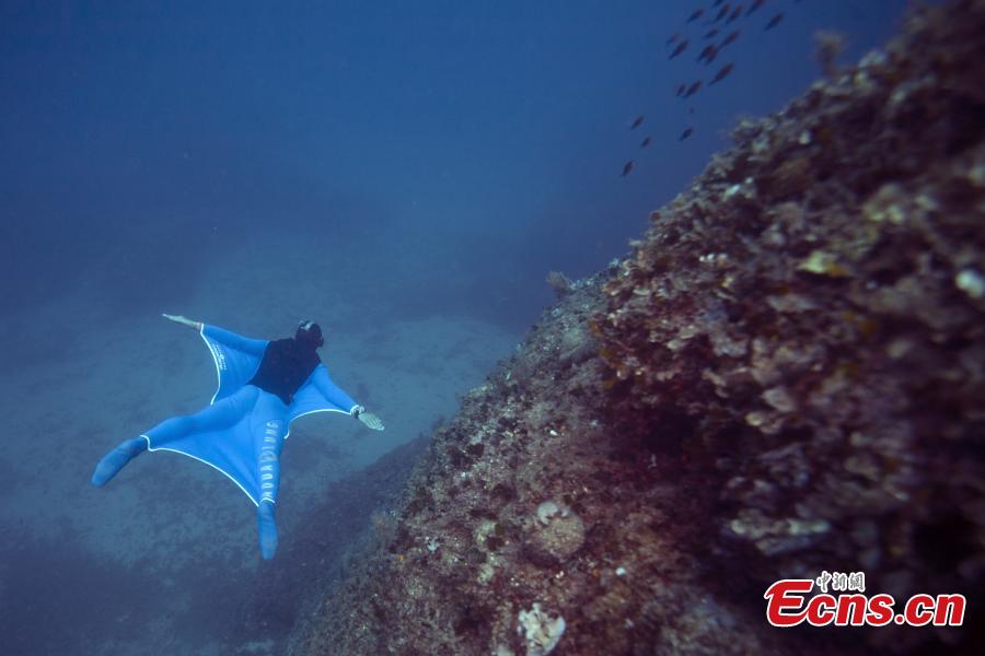 Monaco\'s freediver Pierre Frolla wearing a prototype of an \