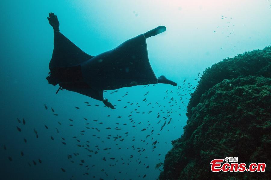 
Monaco\'s freediver Pierre Frolla wearing a prototype of an \