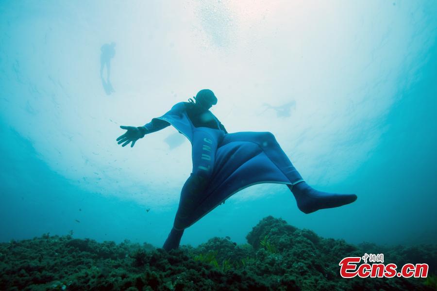 Monaco\'s freediver Pierre Frolla wearing a prototype of an \