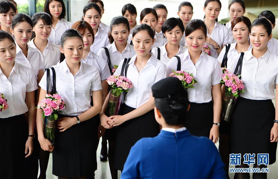 Xiamen Airlines first batch Taiwan cabin crew on show in Xiamen, Aug 16, 2017. 60 passed the examination, and will join the airline in 2 batches.(Photo/Xinhua)