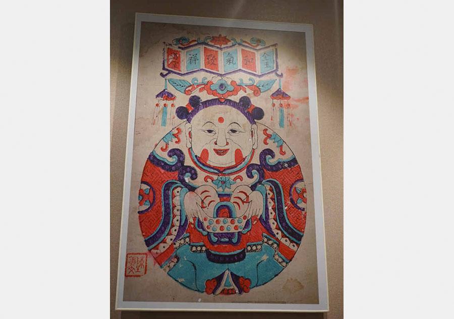 A wood engraving New Year painting by Chen Yiwen. (Photo/chinadaily.com.cn)