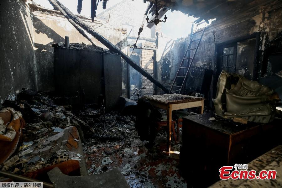 A destroyed house is seen near the warehouse storing ammunition for multiple rocket launcher systems at a military base in Kalynivka, Vinnytsia region, Ukraine September 27, 2017. (Photo/Agencies)