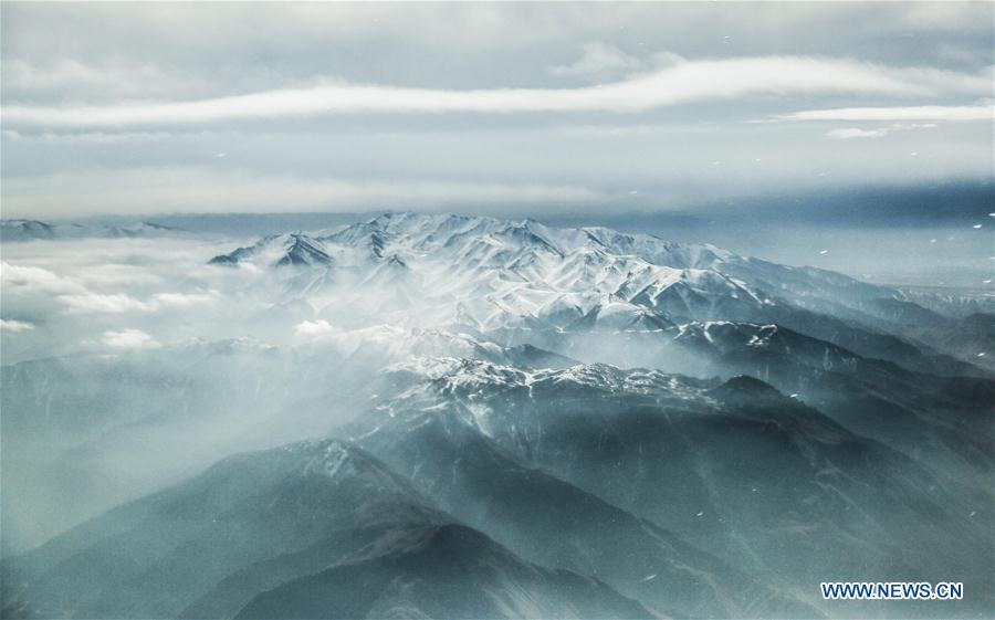 Aerial view of snow-covered Bayan Har Mountains in Qinghai(1/5)