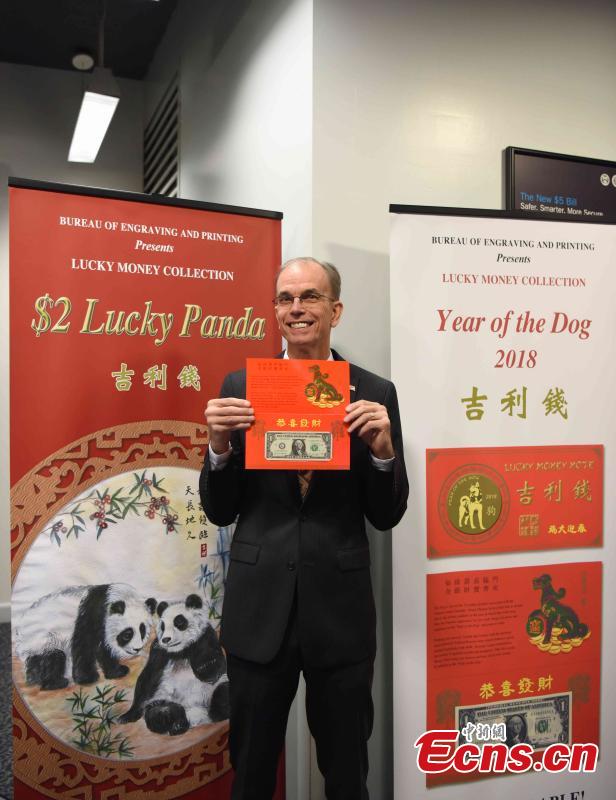 Leonard Olijar, Director of the Bureau of Engraving and Printing, introduces the Year of the Dog 2018 one dollar bill in honor of the Chinese Lunar New Year at the Bureau of Engraving and Printing in Washington, DC, on November 15, 2017. The Year of the Dog 2018 features a $1 Federal Reserve note with a serial number beginning with 