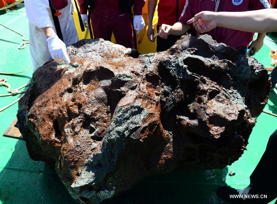Photo taken on Nov. 30, 2017 shows a sulfide sample collected from the south Atlantic. Xiangyanghong 01, China's elite science ship, on Thursday collected the sulfide sample weighed around 3 tons, which is the biggest one of its kind in the country. (Xinhua/Zhang Xudong)