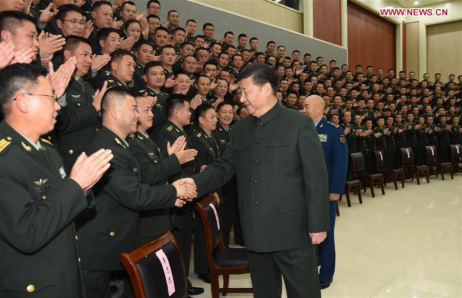 
Chinese President Xi Jinping (R, front), also general secretary of the Communist Party of China (CPC) Central Committee and chairman of the Central Military Commission, meets with senior officers of the 71st Group Army of the People\'s Liberation Army in Xuzhou, east China\'s Jiangsu Province, Dec. 13, 2017. Xi inspected the 71st Group Army of the People\'s Liberation Army in Xuzhou on Dec. 13. (Xinhua/Li Gang)