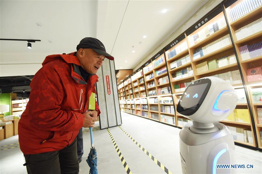 A customer interacts with robot \