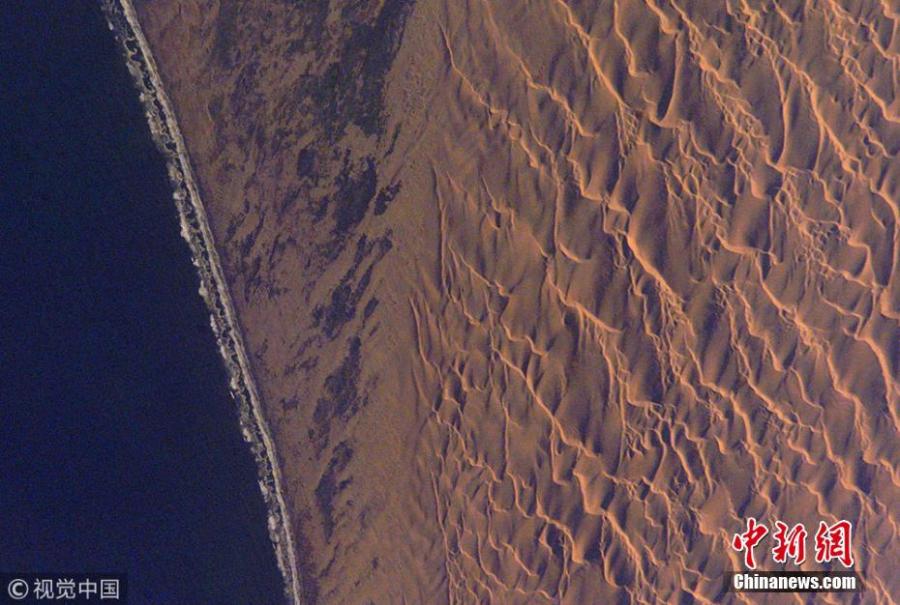 NASA receives thousands of photos taken by satellites and the astronauts on the International Space Station every year, and it recently posted a collection of the best ones in 2017 in the form of a slideshow on YouTube. The photo shows Namib Desert Dunes in Namibia.(Photo/VCG)
