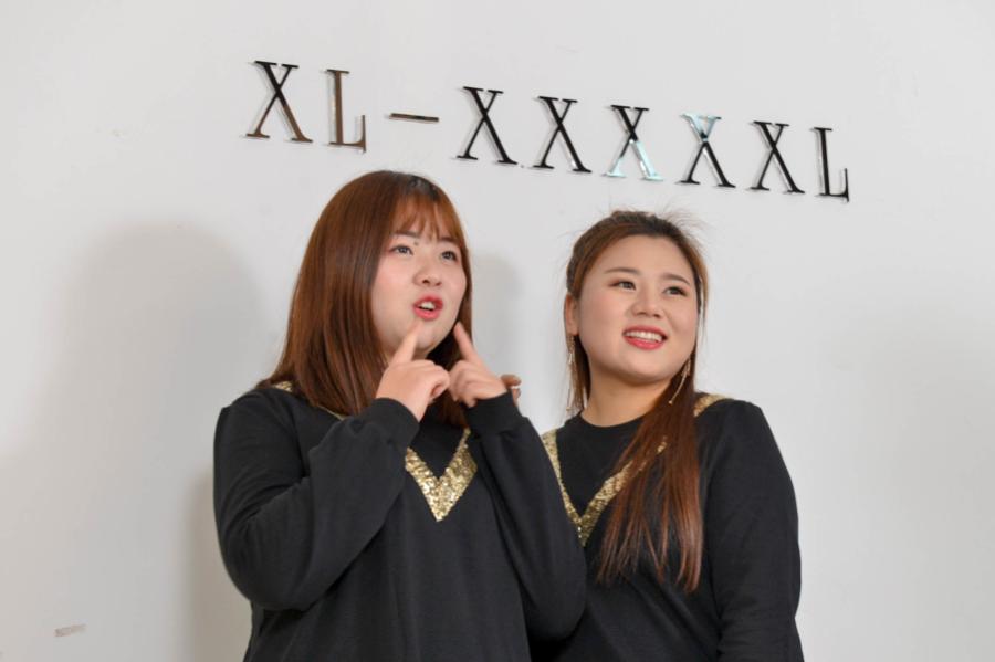 Plus-size models pose for pictures in Hangzhou, Zhejiang province, Dec 28, 2017.(Photo/zjol.com.cn)