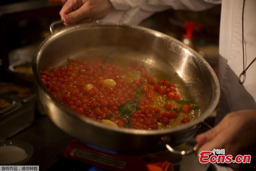 In the photo taken on January 4, 2018, small “drop tomatoes” are spawning new recipes at a restaurant in Tel Aviv, Israel. The “drop tomato” is about the size of a blueberry and Israel’s Kedma company says it is the smallest one ever developed in Israel, perhaps even in the world. (Photo/Agencies)