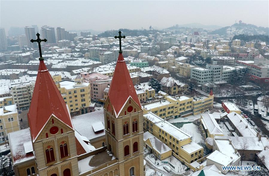 Snowfall seen in Qingdao(5/5)