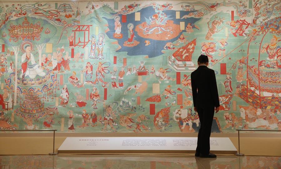 Knowing of Chang Shuhong\'s decision to stay and work on the preservation of Dunhuang, Zhang told Chang what awaited would be like \
