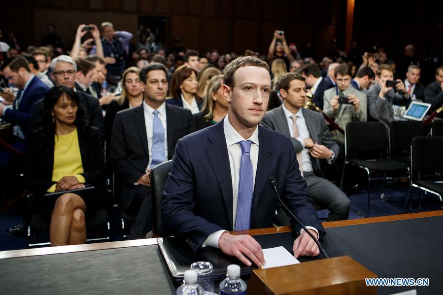 Facebook CEO Mark Zuckerberg (C) testifies at a joint hearing of the Senate Judiciary and Commerce committees on Capitol Hill in Washington D.C., United States, on April 10, 2018. Facebook CEO Mark Zuckerberg told Congress in written testimony on Monday that he is \