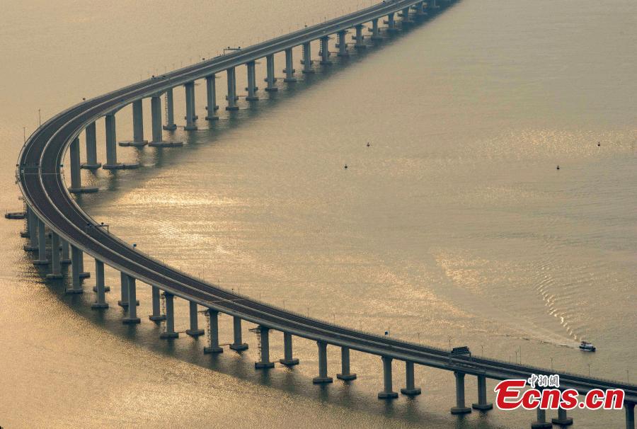 Photo taken on April 11, 2018 shows the Hong Kong-Zhuhai-Macao Bridge in Hong Kong. The 55-kilometer Hong Kong-Zhuhai-Macao Bridge, situated in the Lingdingyang waters of the Pearl River Estuary, will be the world\'s longest sea bridge. The bridge will slash the travel time between Hong Kong and Zhuhai from three hours to just 30 minutes, further integrating cities in the Pearl River Delta. (Photo/China News Service)