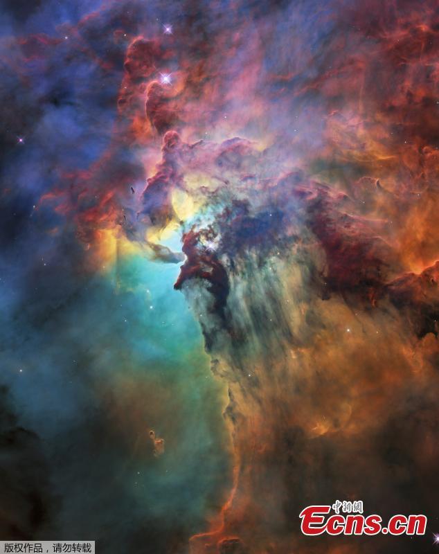 A photo released on April 19, 2018 by the European Space Agency shows this colourful image of the Lagoon Nebula to celebrate the 28th anniversary space of the the NASA/ESA Hubble Space Telescope.  The whole nebula, about 4000 light-years away, is an incredible 55 light-years wide and 20 light-years tall. This image shows only a small part of this turbulent star-formation region, about four light-years across. This stunning nebula was first catalogued in 1654 by the Italian astronomer Giovanni Battista Hodierna, who sought to record nebulous objects in the night sky so they would not be mistaken for comets. Since Hodierna\'s observations, the Lagoon Nebula has been photographed and analysed by many telescopes and astronomers all over the world. The observations were taken by Hubble\'s Wide Field Camera 3 between 12 February and 18 February 2018. (Photo/Agencies)