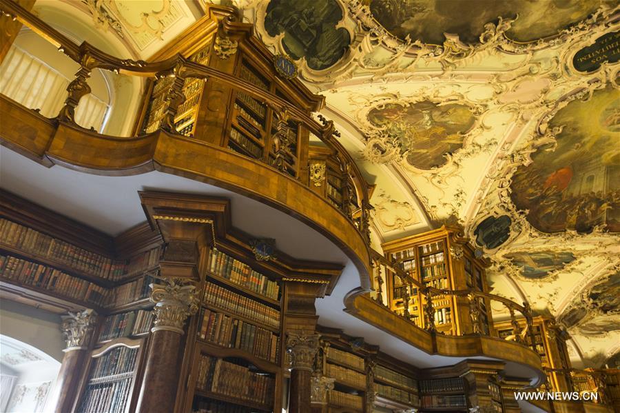 Picture taken on April 20, 2018 shows the Abbey Library in north-eastern Switzerland\'s St. Gallen city. The library is one of the richest and oldest in the world and contains 170,000 works and some 2,100 original medieval handwritten manuscripts, including the earliest-known architectural plan drawn on parchment. (Xinhua/Xu Jinquan)