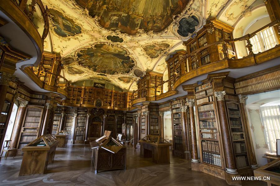 
Picture taken on April 20, 2018 shows the Abbey Library in north-eastern Switzerland\'s St. Gallen city. The library is one of the richest and oldest in the world and contains 170,000 works and some 2,100 original medieval handwritten manuscripts, including the earliest-known architectural plan drawn on parchment. (Xinhua/Xu Jinquan)