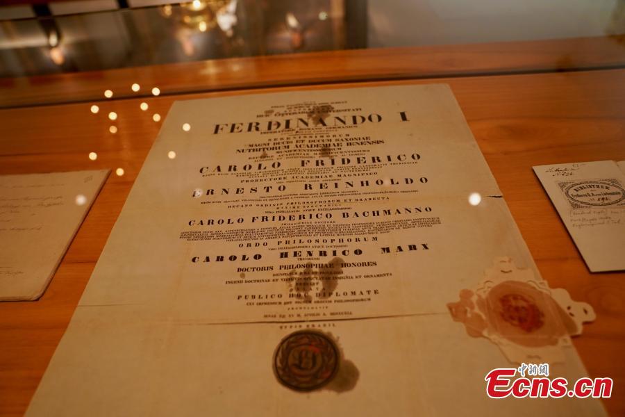 Photo taken on May 6, 2018 shows the certificate of Karl Marx\'s degree for Doctor of Philosophy at the Karl Marx House museum in Trier, Germany. An exhibition is underway to honor the German philosopher as this year marks the 200th anniversary of his birth. (Photo: China News Service/Peng Dawei)