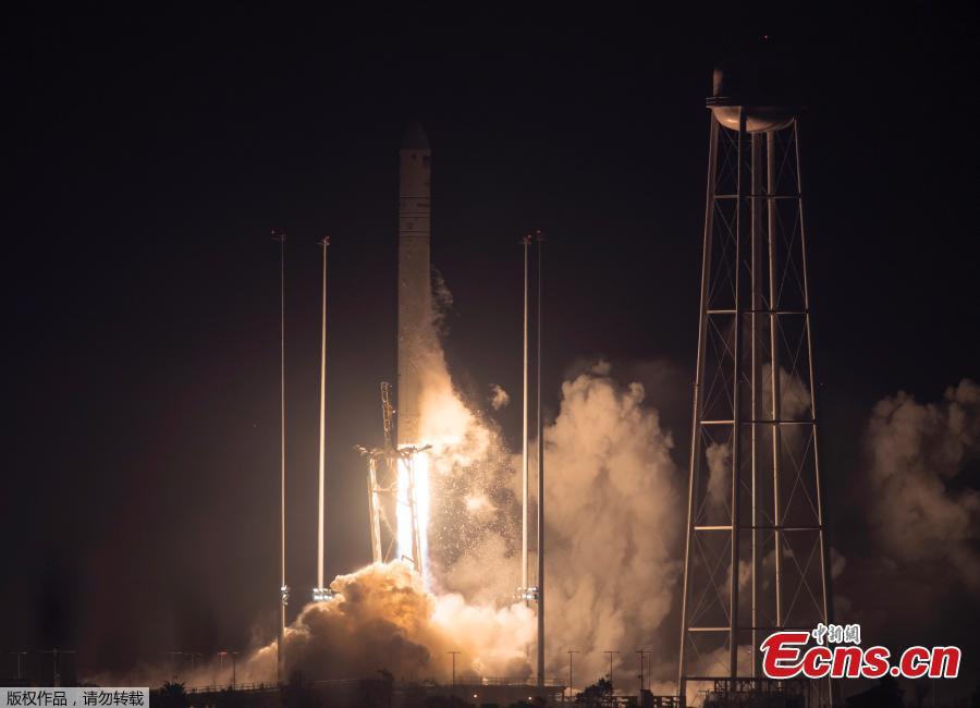 The Orbital ATK Antares rocket, with the Cygnus spacecraft onboard launches at NASA\'s Wallops Flight Facility in Virginia, May 21, 2018. The Orbital ATK launched a fresh load of supplies to the International Space Station. Named for the swan constellation, the Cygnus is making Orbital ATK’s ninth contracted delivery for NASA. SpaceX is NASA’s other supplier. (Photo/Agencies)