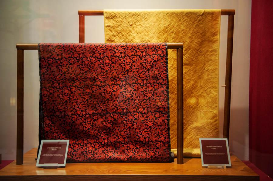 A Qing Dynasty (1644-1911) black satin with red silk embroidery in patterns of dragon, phoenix and flower. (Photo provided to chinadaily.com.cn)

Boasting a history of more than 1,600 years, the Nanjing yunjin brocade is considered the most extravagant silk fabric worn by emperors in ancient times. Its Chinese name yunjin literally refers to the cloud-like splendor of the fabrics.

The Nanjing Yunjin Museum, located in the eastern Chinese city of Nanjing, is dedicated to preserving the age-old weaving technique and creating a platform to promote textile exchanges in and outside China. The museum showcases fabrics, royal robes from Ming (1368-1644) and Qing (1644-1911) dynasties, replicas of the ancient fabrics, as well as techniques of the time-honored weaving art. 

The craftsmanship of yunjin brocade was included on the UNESCO\'s Intangible Cultural Heritage List in 2009.