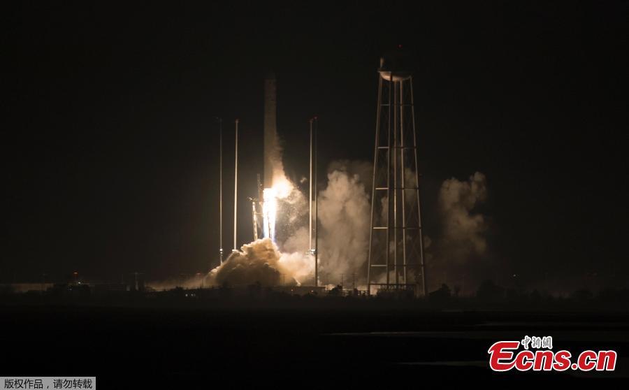The Orbital ATK Antares rocket, with the Cygnus spacecraft onboard launches at NASA\'s Wallops Flight Facility in Virginia, May 21, 2018. The Orbital ATK launched a fresh load of supplies to the International Space Station. Named for the swan constellation, the Cygnus is making Orbital ATK’s ninth contracted delivery for NASA. SpaceX is NASA’s other supplier. (Photo/Agencies)