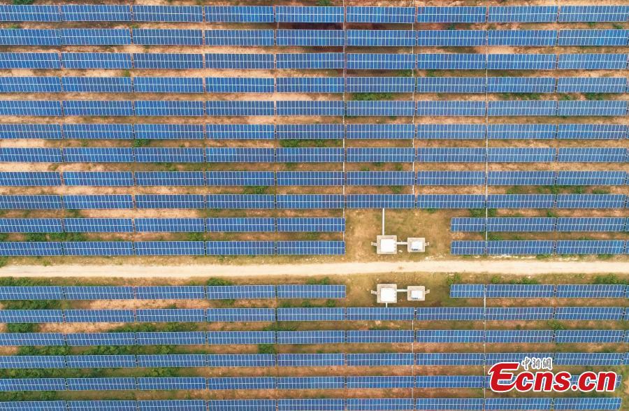 An aerial view of a photovoltaic power plant in Taihe County, East China’s Jiangxi Province, May 23, 2018. The 30MW project, with an investment of 240 million yuan ($37.6 million), was part of efforts to help eradicate poverty in the county. (Photo: China News Service/Deng Heping)