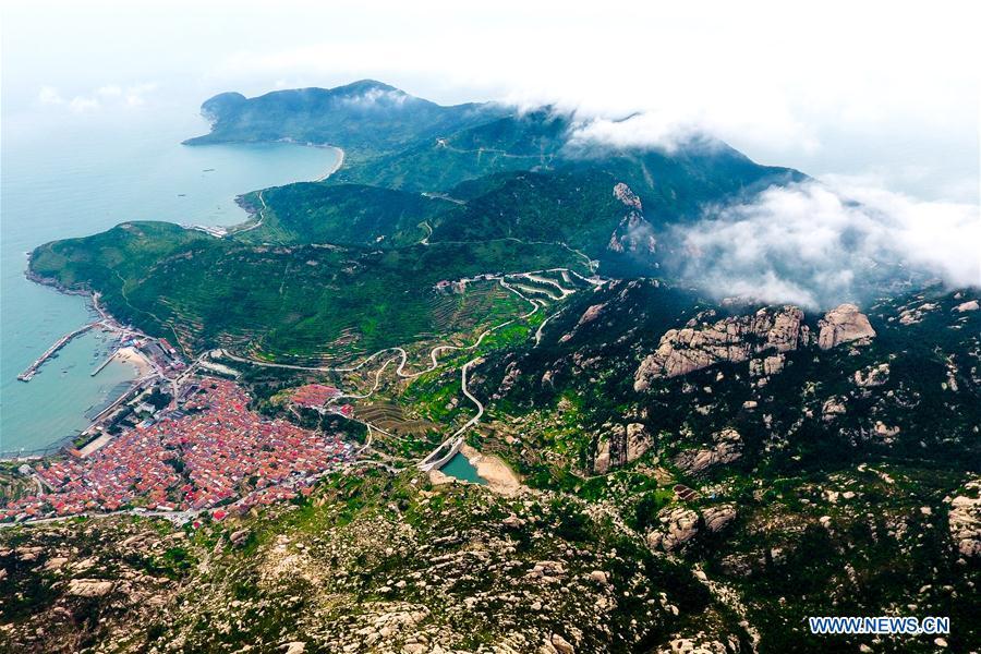 Aerial photo taken on May 21, 2018 shows sea of clouds over the Laoshan Mountain in Qingdao, east China\'s Shandong Province. (Xinhua/Guo Xulei)