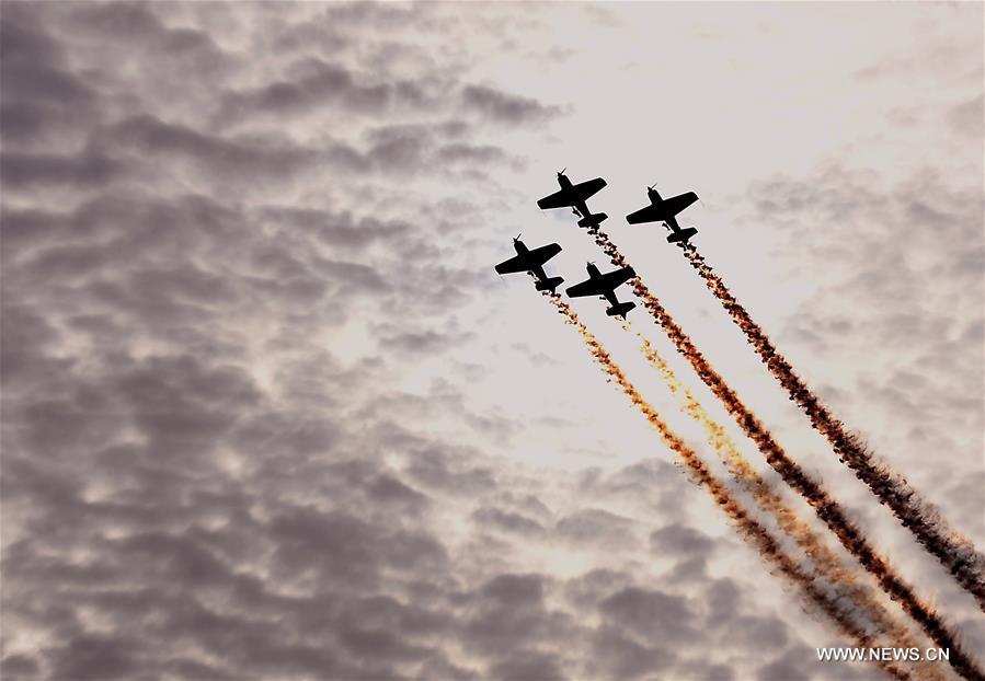 Aerobatics aircrafts perform during a rehearsal for the 10th Air Sports Cultural Tourism Festival in Anyang, central China\'s Henan Province, May 24, 2018. The three-day air show begins on May 25. (Xinhua/Li An)