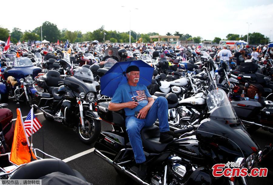Participants gather in the parking lot of the Pentagon as thousands of military veterans and their supporters participate in the 31st annual Rolling Thunder motorcycle rally and Memorial Day weekend \