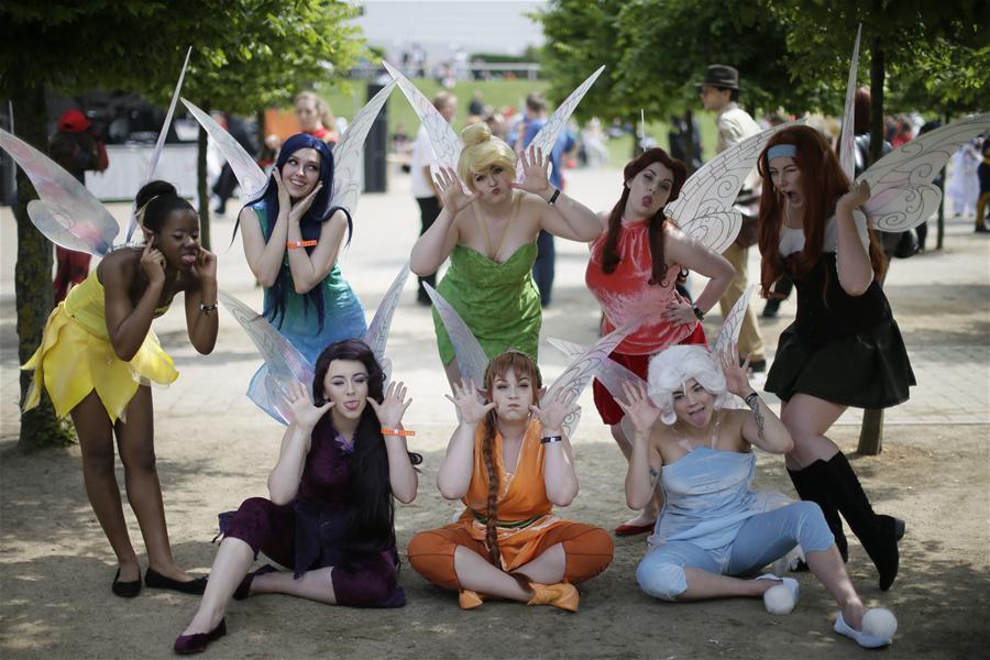 People dressed in costumes pose for a photo at the MCM Comic Con at the ExCel center in London, Britain, on May 27, 2018. The MCM Comic Con was held in London from May 25 to May 27, attacting lots of comic fans to the popular culture gathering. (Xinhua/Tim Ireland)