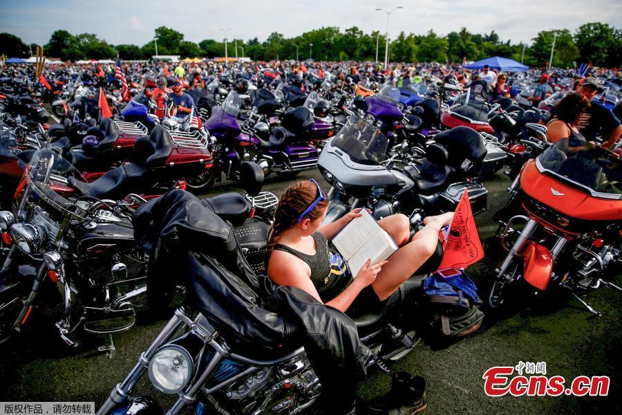 Participants gather in the parking lot of the Pentagon as thousands of military veterans and their supporters participate in the 31st annual Rolling Thunder motorcycle rally and Memorial Day weekend \