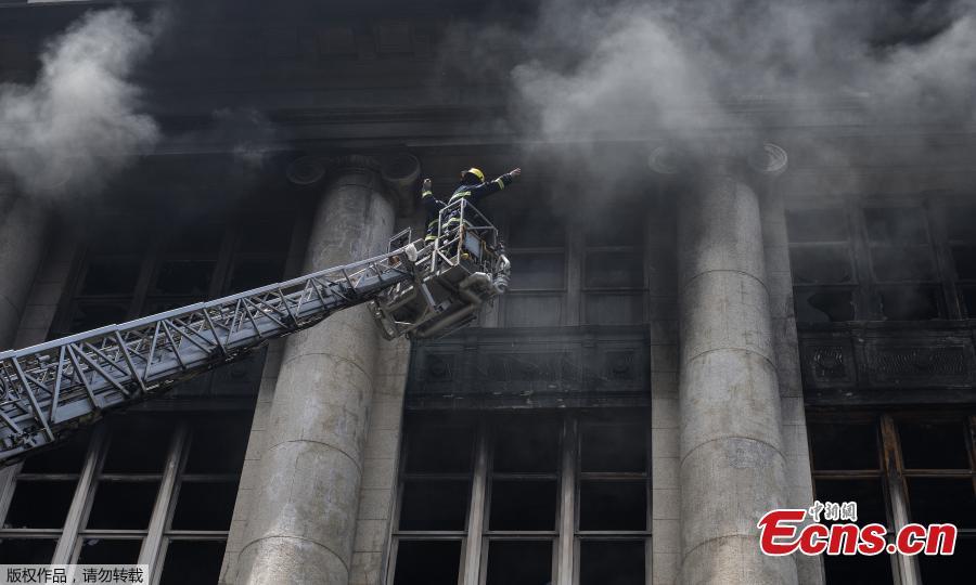 Firemen extinguish a fire at the administrative offices of the National Archives of the Philippines in Manila on May 28, 2018. (Photo/Agencies)