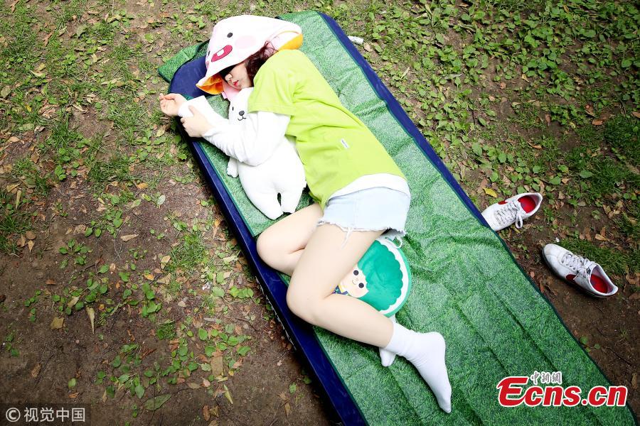 A sleeping contest is held in Seoul Forest in South Korea, May 27, 2018. More than 8,500 people applied to join the contest for its third edition, with the longest sleeper the winner. (Photo/VCG)