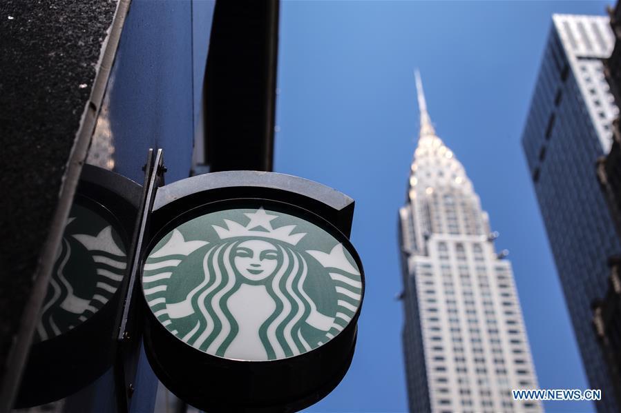 A Starbucks logo is pictured in Manhattan, New York, the United States, May 29, 2018. Starbucks closed about 8,000 company-owned stores in the United States on Tuesday afternoon to offer nearly 175,000 employees a mandatory anti-bias training. (Xinhua/Li Muzi)