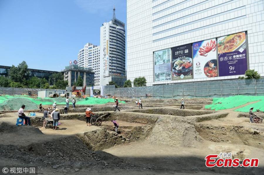 A view of an excavation at a construction site near Chunxi Road in Chengdu City, Southwest China’s Sichuan Province. Experts from the Chengdu Institute of Relics and Archaeology found remains of streets and buildings dating back to the late Tang Dynasty (618-907) to Southern Song Dynasty (960-1279) at the site, believing the findings are important to understand city layout and architecture in ancient China. (Photo/VCG)