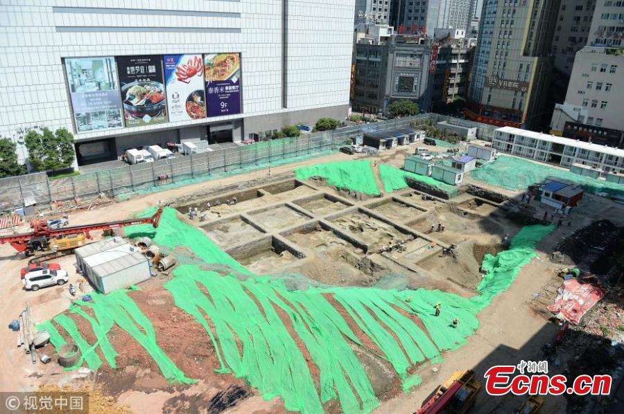 A view of an excavation at a construction site near Chunxi Road in Chengdu City, Southwest China’s Sichuan Province. Experts from the Chengdu Institute of Relics and Archaeology found remains of streets and buildings dating back to the late Tang Dynasty (618-907) to Southern Song Dynasty (960-1279) at the site, believing the findings are important to understand city layout and architecture in ancient China. (Photo/VCG)