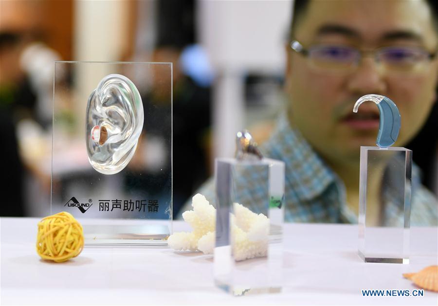 Hearing aid equipments are displayed at the 2018 2018 Beijing International Audiology Conference in Beijing, capital of China, June 2, 2018. The 2018 Beijing International Audiology Conference kicked off here Saturday. (Xinhua/Zhang Chenlin)