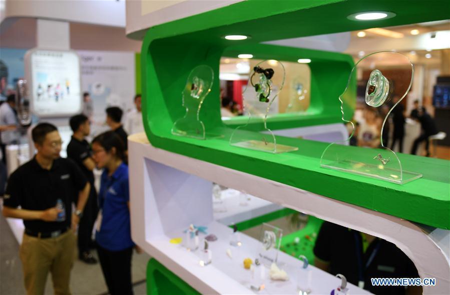 Hearing aid equipments are displayed at the 2018 Beijing International Audiology Conference in Beijing, capital of China, June 2, 2018. The 2018 Beijing International Audiology Conference kicked off here Saturday. (Xinhua/Zhang Chenlin)